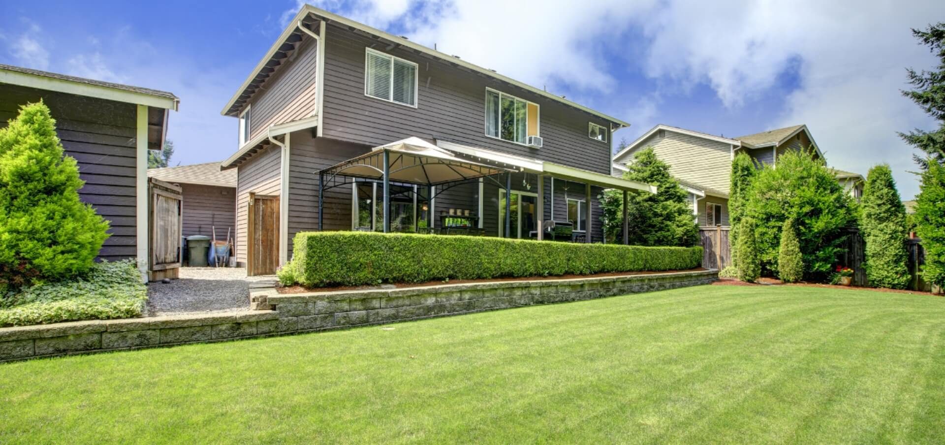 Finished lawn and landscaping in front of a Massachusetts home